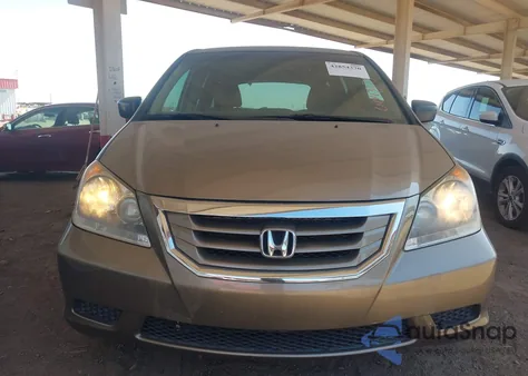 2010 Honda Odyssey Lx z USA, uszkodzony, nr VIN 5FNRL3H29AB004878